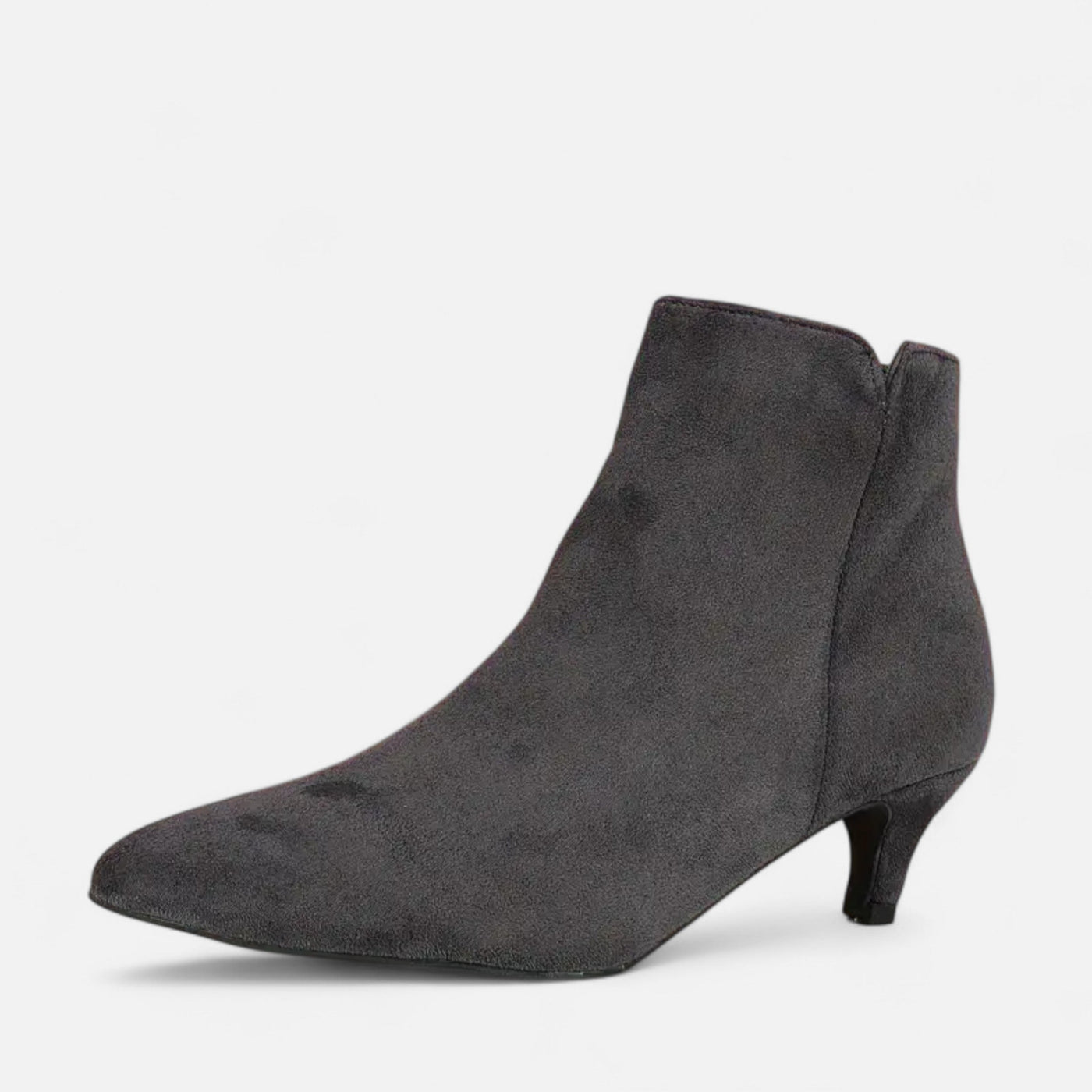 Grey suede kitten heel ankle boots with pointed toe and side zip closure, paired three-quarter view showing low tapered heel and minimalist upper construction