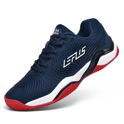 Navy blue athletic court sneaker with white midsole panel and red outsole detail, side angle view featuring raised wave texture pattern and multi-toned rubber sole construction