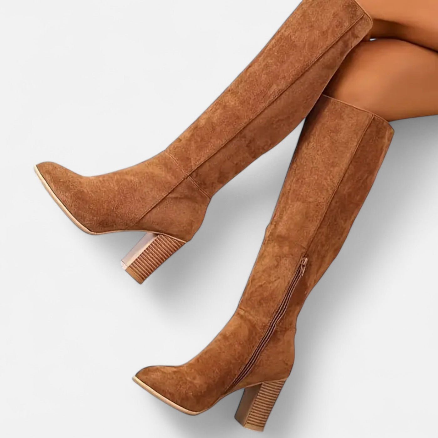 Tan cognac suede high-heel boots with textured block heel and almond toe shape, overhead flat lay perspective displaying full shaft length and side zip fastening