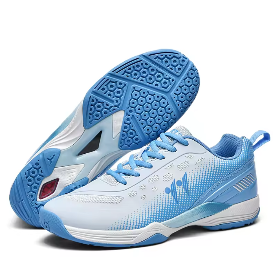 White badminton shoe with sky blue gradient mesh panels and matching laces, paired view showing hexagonal pattern outsole traction design and midsole cushioning structure